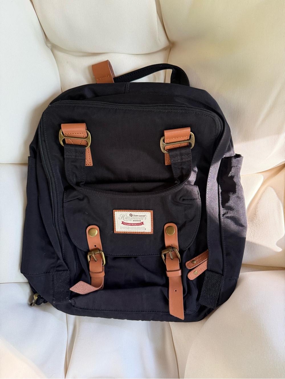Amazon Black Canvas Backpack with Brown Accents